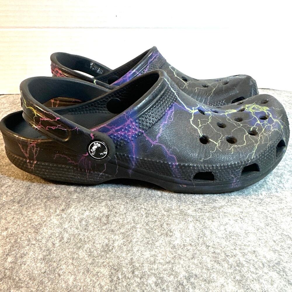 Crocs multi colored lighting with yellow strikes on black unisex M =6  W=8